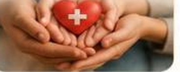 Hands cupped gently around a small red heart symbol